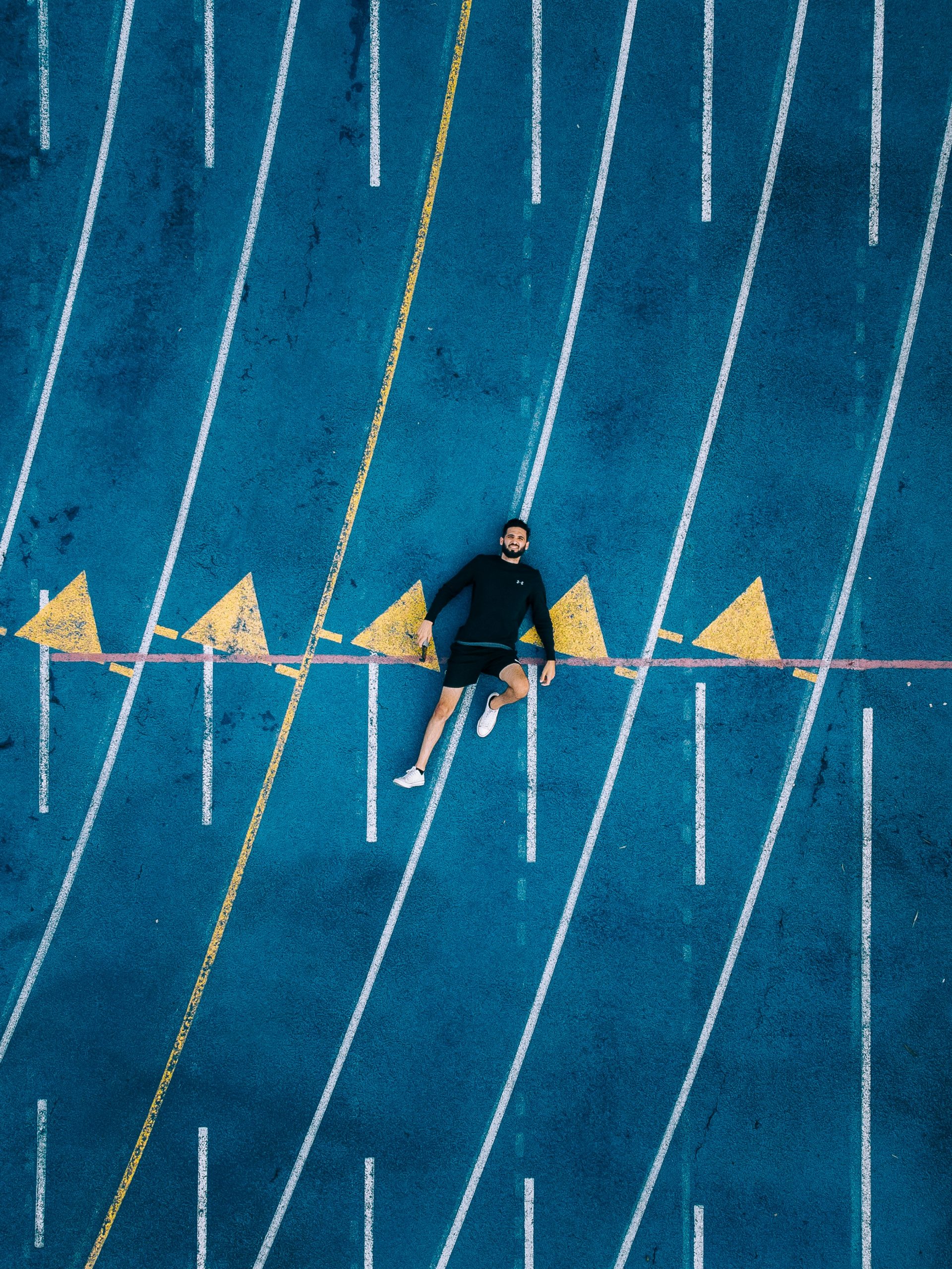 Staying near the starting line of a race.